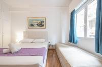 Postel nebo postele na pokoji v ubytování Victoria Majestic Suites Apartments