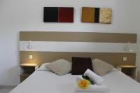 A bed or beds in a room at Agi Residencial Almadraba