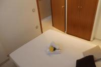 A bed or beds in a room at Agi Residencial Almadraba