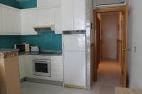 A kitchen or kitchenette at Agi Residencial Almadraba