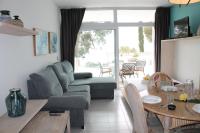A seating area at Agi Residencial Almadraba