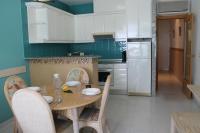 A kitchen or kitchenette at Agi Residencial Almadraba