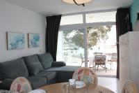 A seating area at Agi Residencial Almadraba