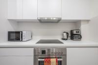 A kitchen or kitchenette at Elegant Suite by CloudKeys