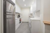 A kitchen or kitchenette at Elegant Suite by CloudKeys