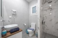 A bathroom at Elegant Suite by CloudKeys