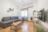 A seating area at Elegant Suite by CloudKeys