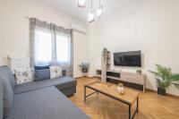 A television and/or entertainment centre at Elegant Suite by CloudKeys