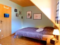 Postel nebo postele na pokoji v ubytování SchwarzWild - Ferienwohnung und Ferienzimmer