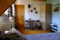 Postel nebo postele na pokoji v ubytování SchwarzWild - Ferienwohnung und Ferienzimmer