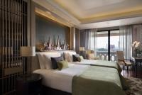 Postel nebo postele na pokoji v ubytování Anantara Riverside Bangkok Resort