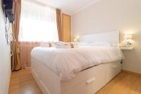 Postel nebo postele na pokoji v ubytování Global Properties, Apartamento Ideal Familias en Canet Playa