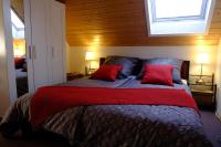 Postel nebo postele na pokoji v ubytování SchwarzWild - Ferienwohnung und Ferienzimmer