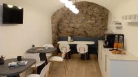Reštaurácia alebo iné gastronomické zariadenie v ubytovaní Relais Sant'Anna
