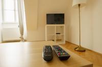 Telewizja i/lub zestaw kina domowego w obiekcie Comfort Apartments - Stephansdom