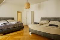 Łóżko lub łóżka w pokoju w obiekcie Comfort Apartments - Stephansdom