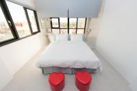 a room with two beds and two red hearts at Discovery B&amp;B in Linbian