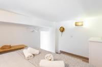 Posteľ alebo postele v izbe v ubytovaní Stay U-nique Apartments Travessera II