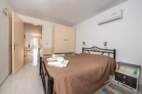 Postel nebo postele na pokoji v ubytování Villa Giorgos