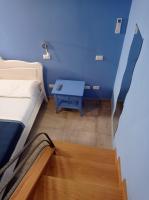 Posteľ alebo postele v izbe v ubytovaní Villa Mami Luroviga