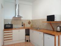 Kuchyňa alebo kuchynka v ubytovaní Rasa Sayang Apartments City Centre