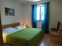 Postel nebo postele na pokoji v ubytování No stress on Cres