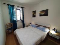 Postel nebo postele na pokoji v ubytování No stress on Cres