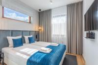Posteľ alebo postele v izbe v ubytovaní Ambria Apartments Platan Complex