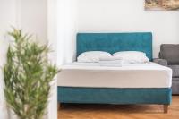 Postel nebo postele na pokoji v ubytování Victoria Sun Apartments