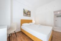 Postel nebo postele na pokoji v ubytování Victoria Sun Apartments
