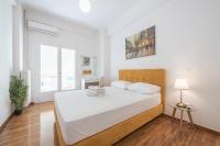 Postel nebo postele na pokoji v ubytování Victoria Sun Apartments