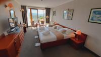 Posteľ alebo postele v izbe v ubytovaní Rosengarten Hotel & Restaurant