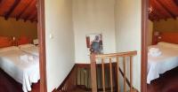 A bed or beds in a room at Complejo la Regalina
