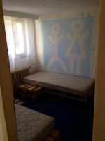 Postel nebo postele na pokoji v ubytování BaselHostel