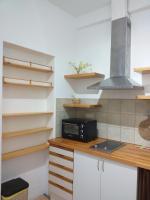 Kuchyňa alebo kuchynka v ubytovaní Rasa Sayang Apartments City Centre