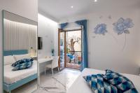 A bed or beds in a room at Maison Marienne - Deluxe B&B