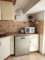 Kuchyňa alebo kuchynka v ubytovaní Sunset View Apartment - Cozy Apartment with Stunning Panoramic View