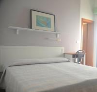 Posteľ alebo postele v izbe v ubytovaní Hotel Zenith