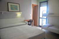 Posteľ alebo postele v izbe v ubytovaní Hotel Zenith