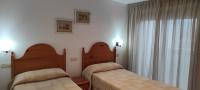 Postel nebo postele na pokoji v ubytování Hotel Grove