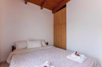 Posteľ alebo postele v izbe v ubytovaní Ioannis Appartment
