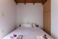 Posteľ alebo postele v izbe v ubytovaní Ioannis Appartment