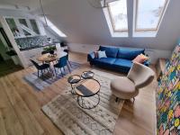 Posedenie v ubytovaní Uroczy Penthouse