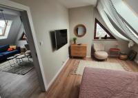Posedenie v ubytovaní Uroczy Penthouse