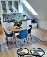 Kuchyňa alebo kuchynka v ubytovaní Uroczy Penthouse