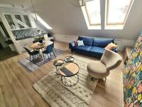 Posedenie v ubytovaní Uroczy Penthouse