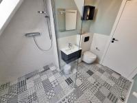 Kúpeľňa v ubytovaní Uroczy Penthouse
