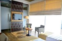 Belmont Boutique Hotel - Free Airport Shuttle Serviceにあるテレビまたはエンターテインメントセンター
