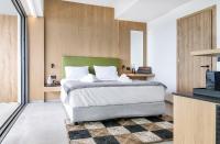 Posteľ alebo postele v izbe v ubytovaní SAVUS Boutique Hotel