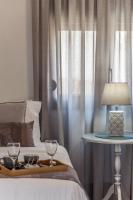 Posteľ alebo postele v izbe v ubytovaní Estia Apartment